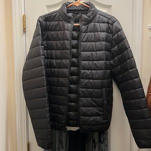 Womens small black puffer jacket. In perfect condition
